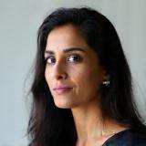 Professional portrait of Dr. Anya Sharma, Human Rights Advocate.